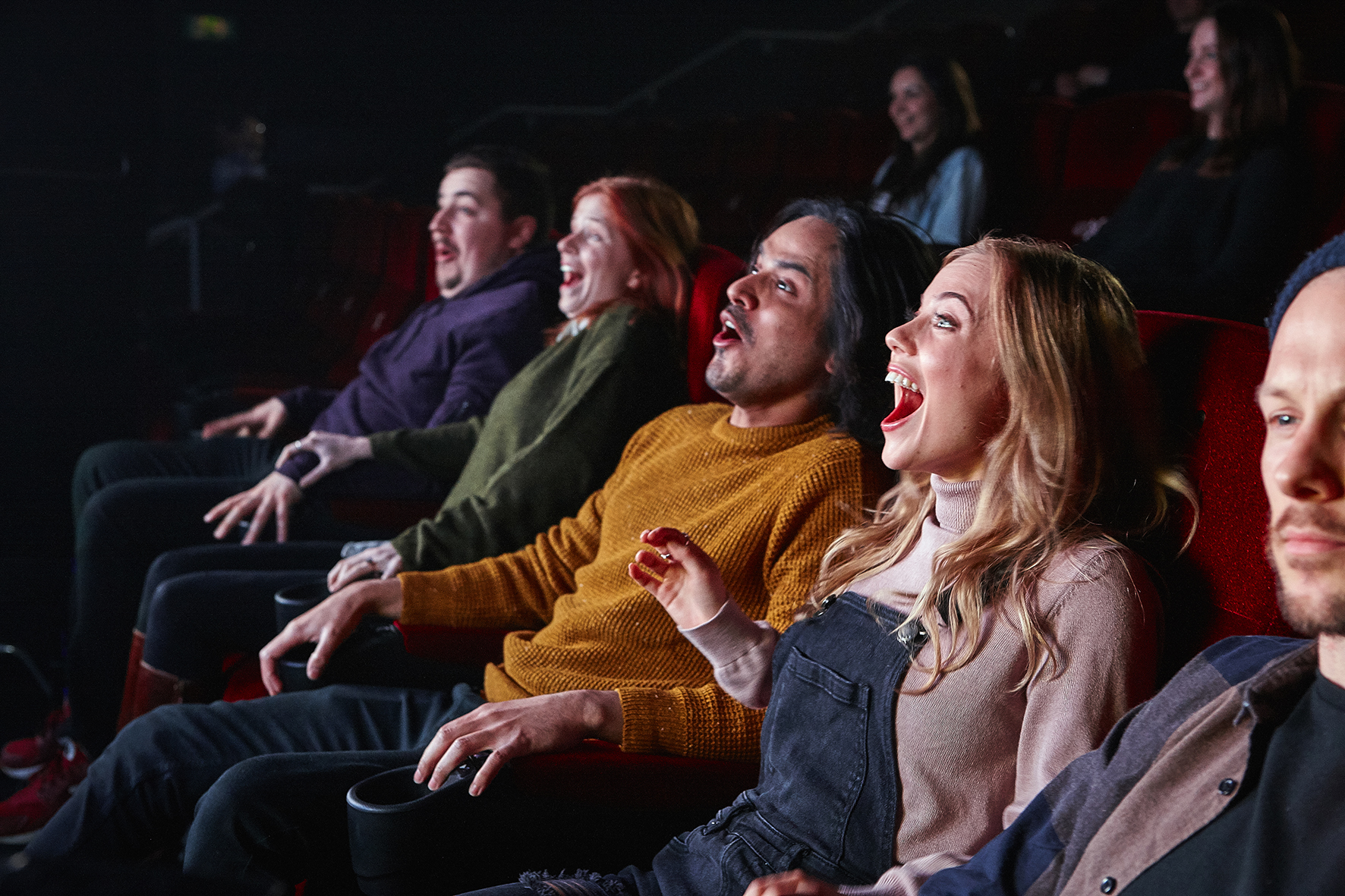The immersive movie theatre uses high-tech motion seats and special effects...