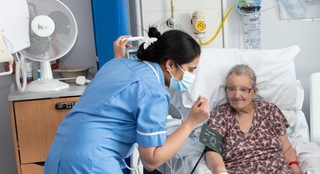 A woman being treated on a ward