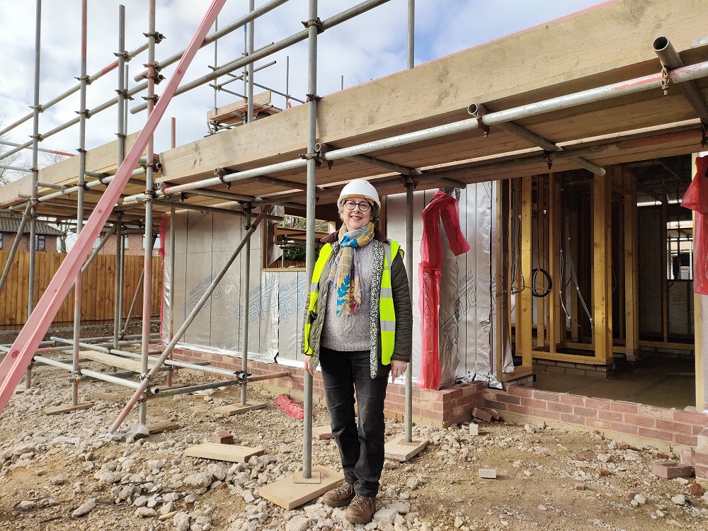 Councillor Gail Harris visits the site in Mile Cross where new social housing is being built.