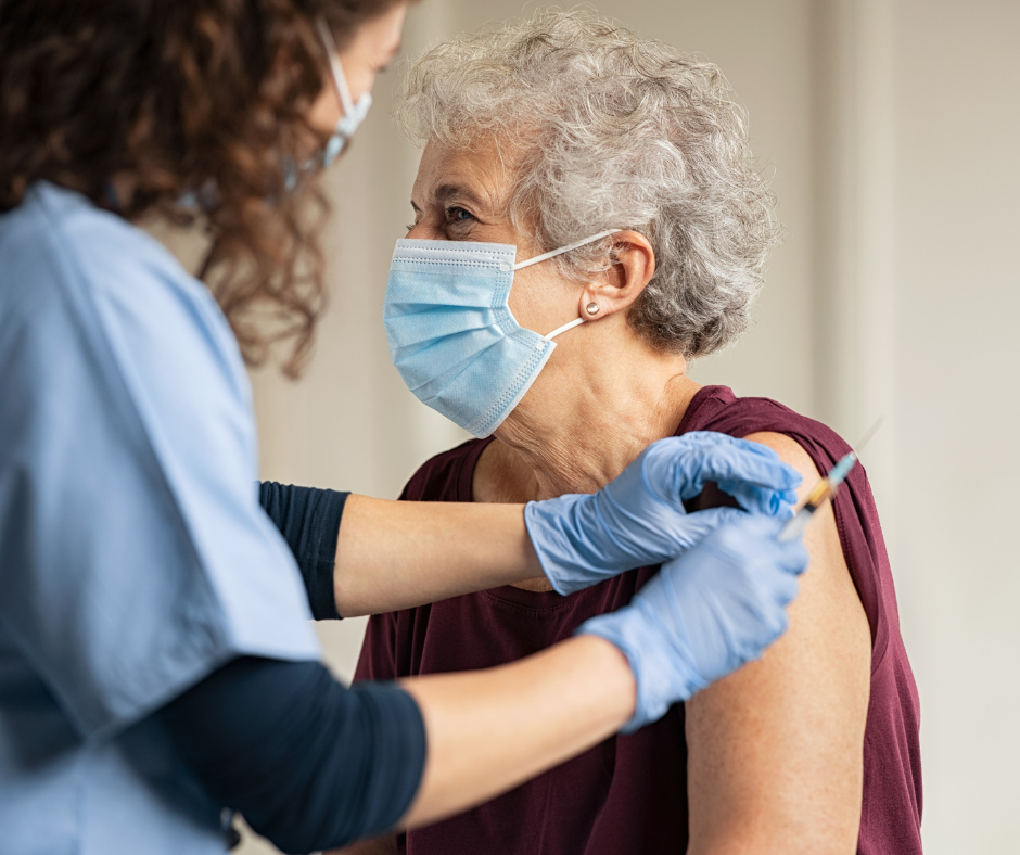 nurse giving shot