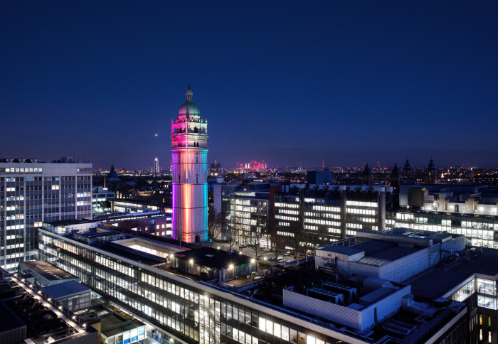 Queen's Tower lit up with rainbow lights
