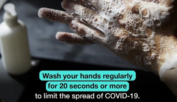 Hands washing with soap and the message 'wash your hands regularly for 20 seconds or more'