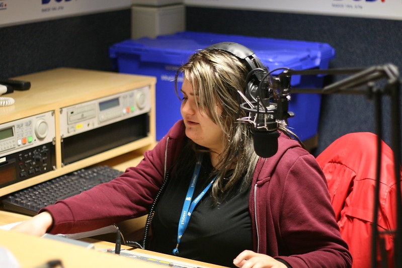 Music student in studio with microphone