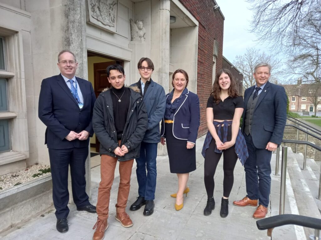  From left to right: Cllr Andrew Parry (Dorset Council Portfolio Holder for Children, Education, Skills and Early Help) , Stanley (newly elected member of Youth Parliament), Kerim (deputy), Theresa Leavy (Dorset Council's Exec. Director for children), Sapphire (deputy) and Matt Prosser (Dorset Council's Chief Executive).