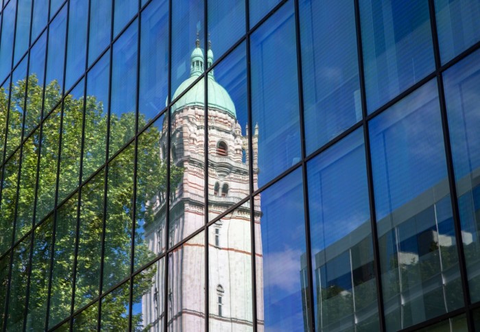 The Queen's Tower reflected in a window