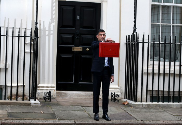 Rishi Sunak, Chancellor of the Exchequer, leaves No.11 Downing Street to present his budget at the House of Commons