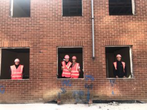 A picture of Fred at the new breast care centre, with his mum Claire and Beardwell's Brian and Archie