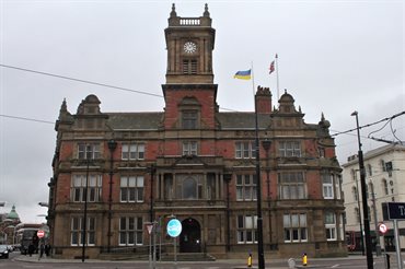Council building flying the blue and yellow Ukrainian flag