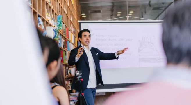 man talking to a class