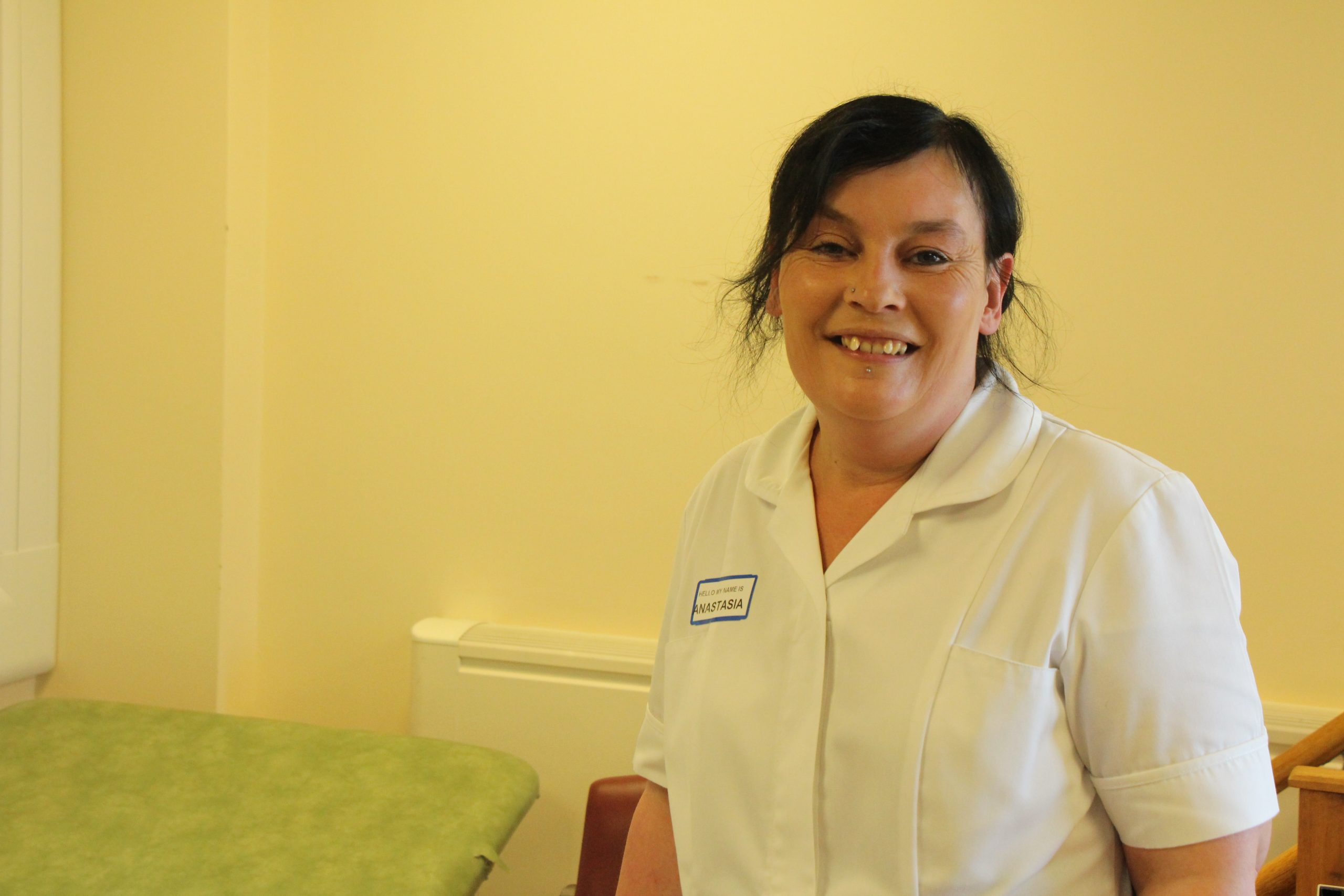 Team support worker Ana in a corridor