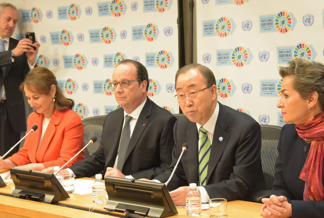 French president Francois Hollande appears with then-UN secretary-general Ban Ki-Moon after signing of the Paris Climate Accord