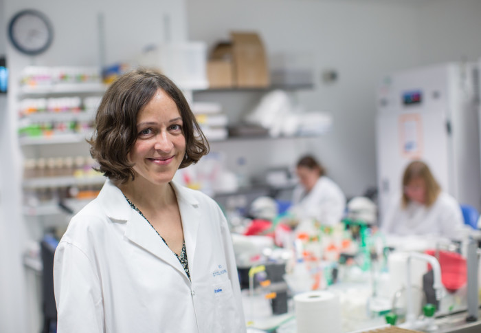 Professor Irene Miguel-Aliaga stands in a lab