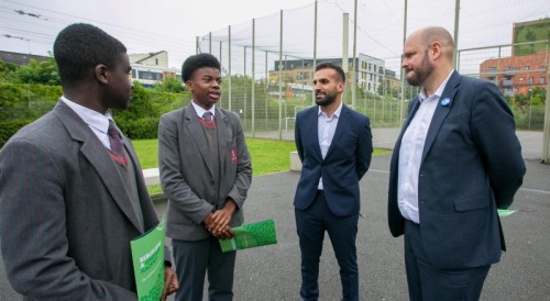 Cllr Mete Coban and Mayor Philip Glanville with students from Cardinal Pole School (credit Gary Manhine and Hackney Council)