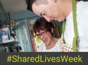 Shared Lives carer and the person they care for cooking together at home.