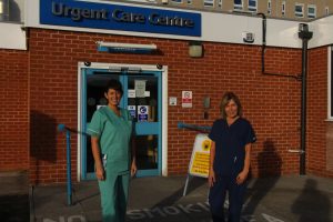 Two nurses in front of urgent care centre