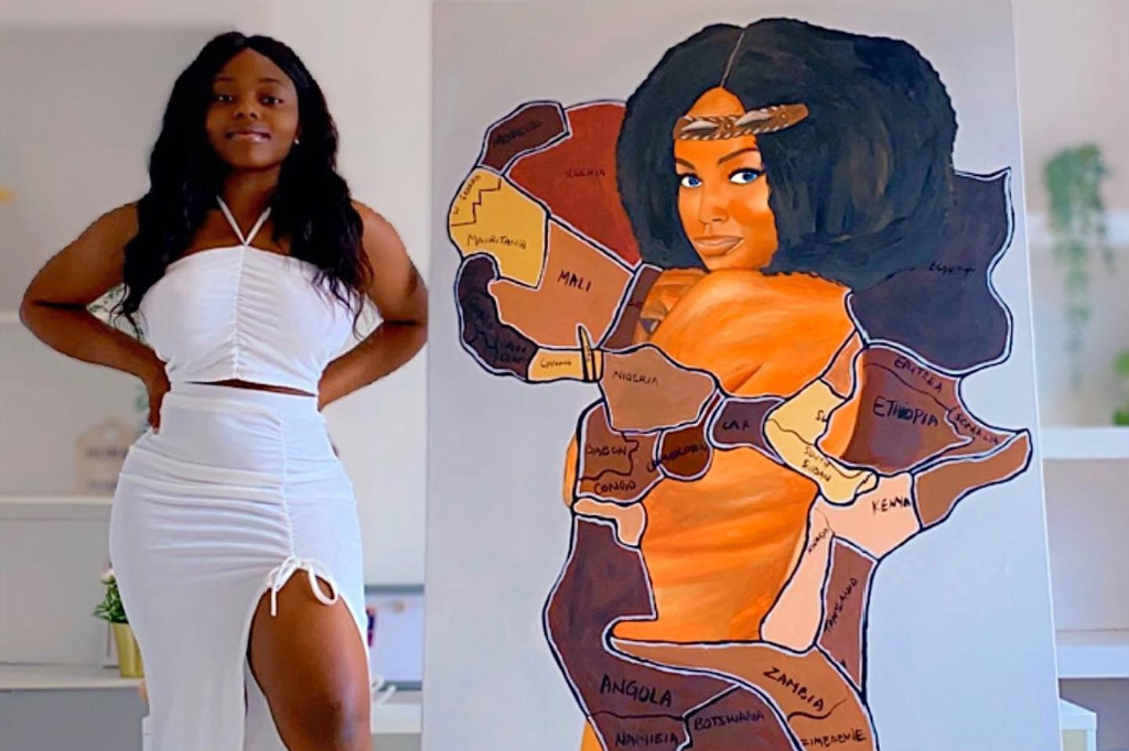 Student stood net to her painting