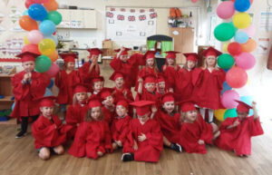 Group of happy children dressed in red