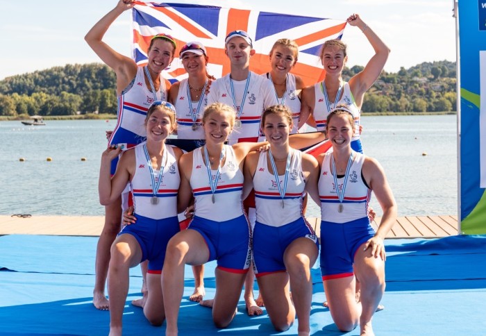 Lizzie Witt (top right) at the World Rowing U23 Championships celebrating their silver medal success