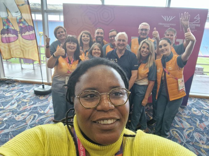 Selfie showing a group of Commonwealth Games volunteers with Leader Cllr Ian Ward in middle and Cllr Sharon Thompson in the foreground taking the selfie