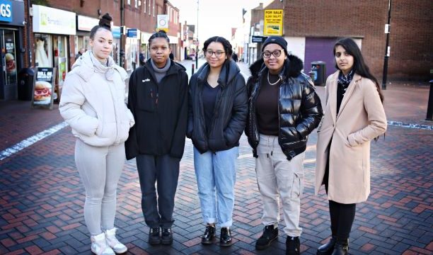 Five female students standing in Wednesbury town centre