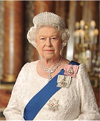 HM The Queen in white dress and blue sash wearing tiara.