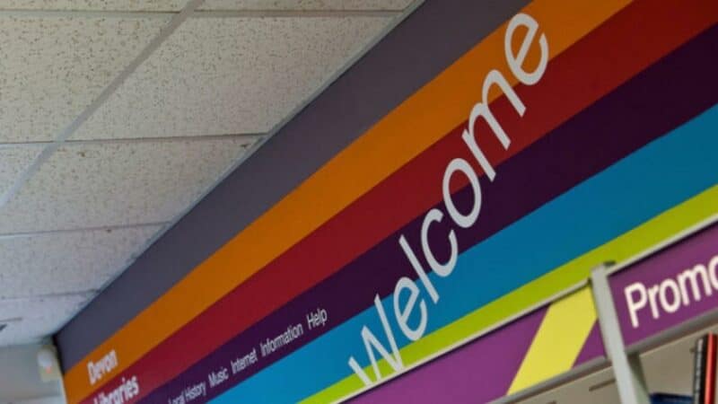 A 'welcome' sign above the door of one of our libraries