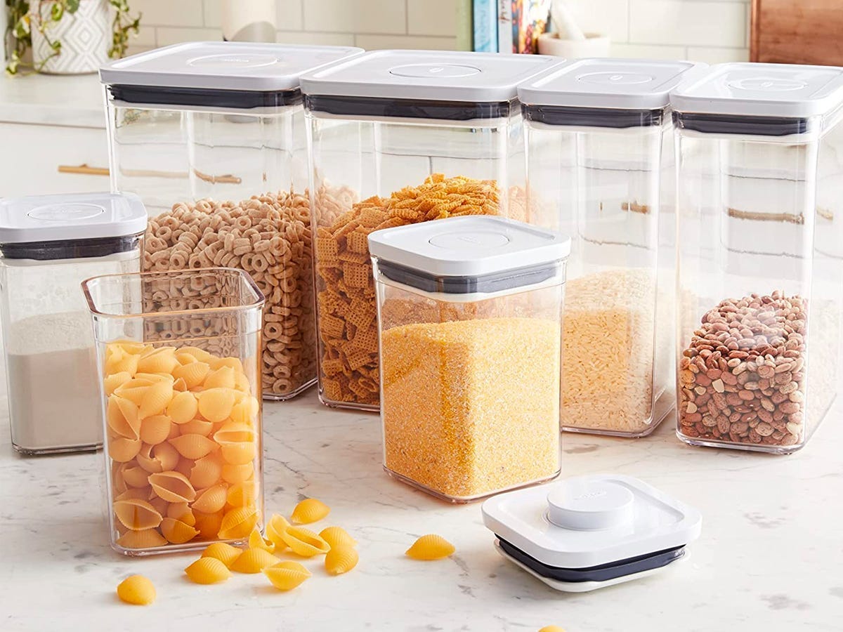 Cyber Monday 2022 Deal: The Oxo Good Grips 7-Piece POP Container Set storing various dry foods on a marble kitchen counter.