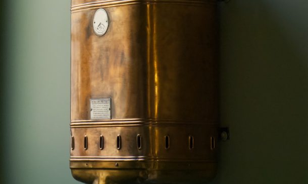 brown steel container on white wall