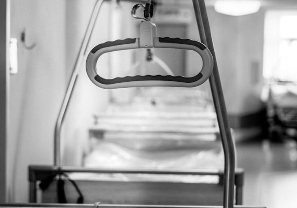 grayscale photo of a stainless steel bar