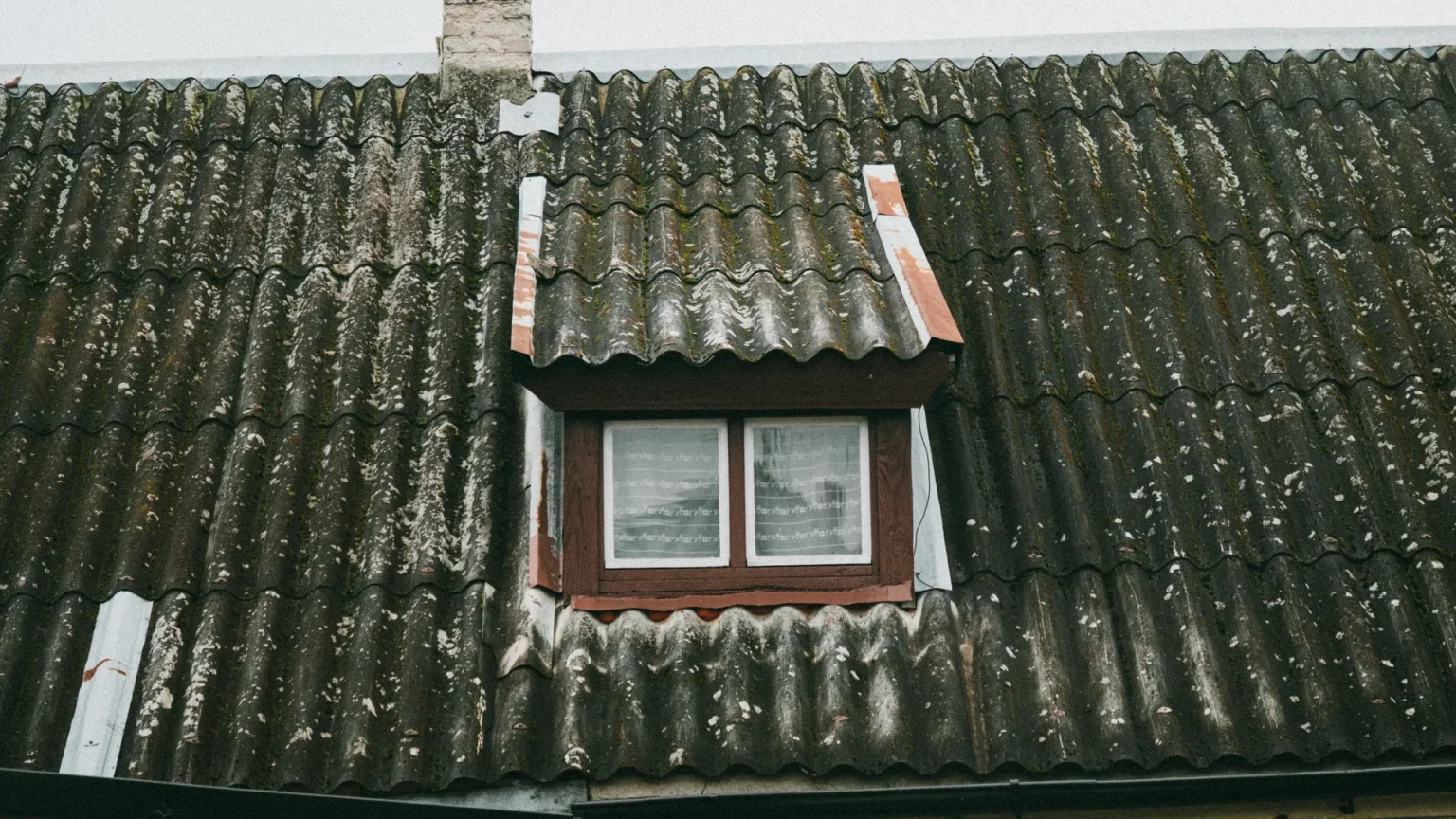 Interior of an older Cleveland home showing insulation and building materials that may contain asbestos