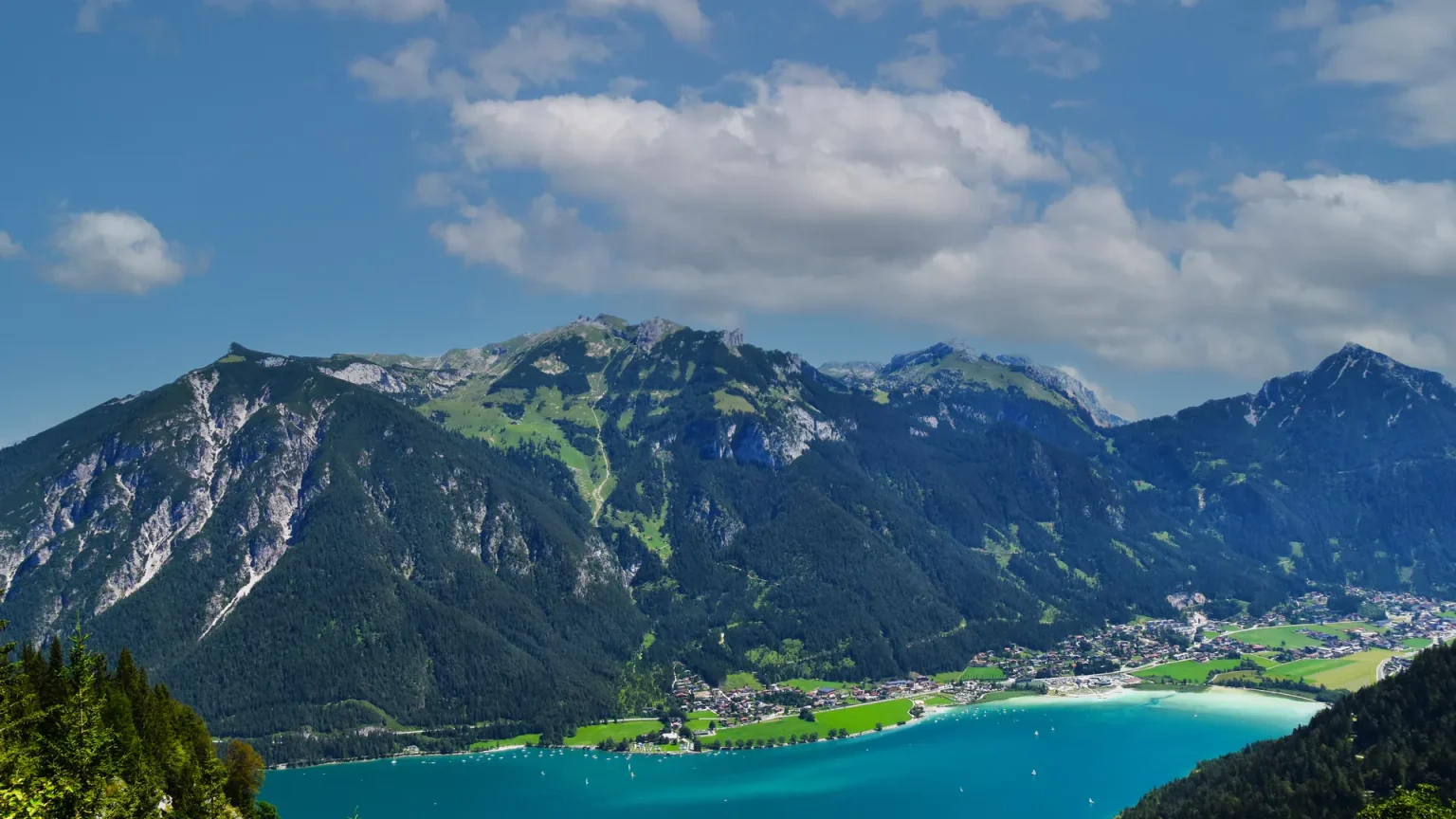 What Are the Best Family Hotels in Tyrol? Turquoise Lake Achensee in Tyrol surrounded by the Austrian Alps