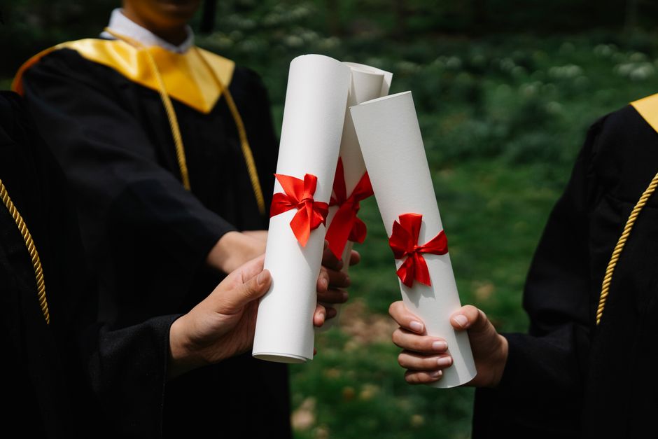 Advancing Your Career with Lamar University’s Master of Education in Educational Technology Leadership Graduates holding diplomas, symbolising completion of a masters degree