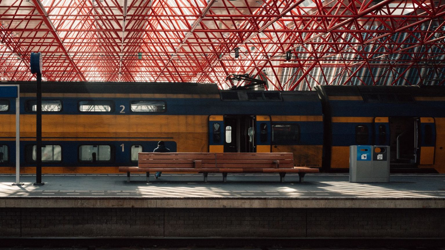Government adds £200 million to Leeds station upgrade, with new overbridge and three entrances A busy railway station concourse with ticket barriers and platforms