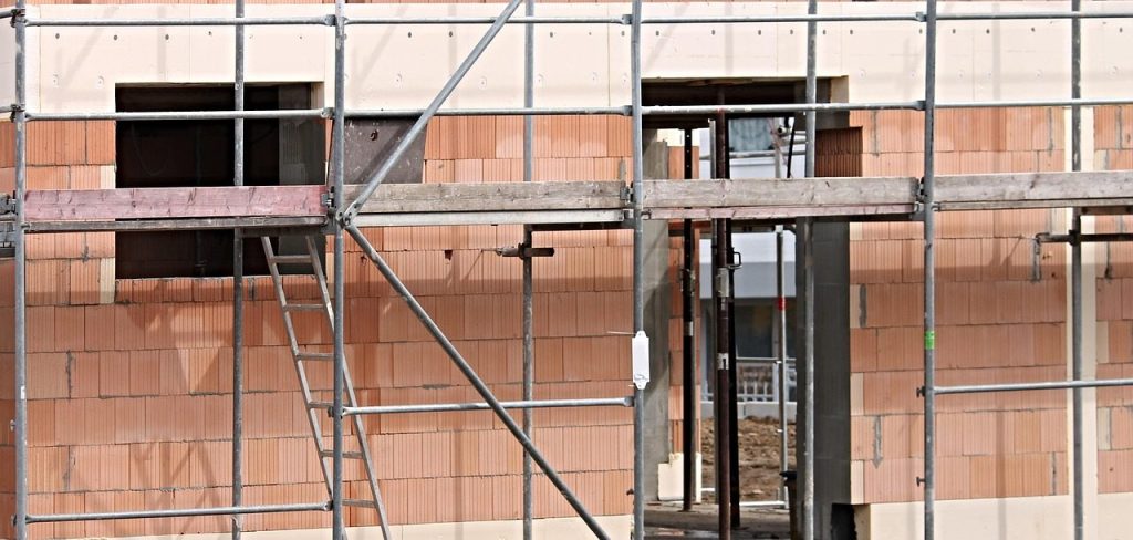 More Homeowners Are Building Instead of Moving, and They’re Reading Quotes More Closely Than Ever House extension under construction with brick walls and scaffolding