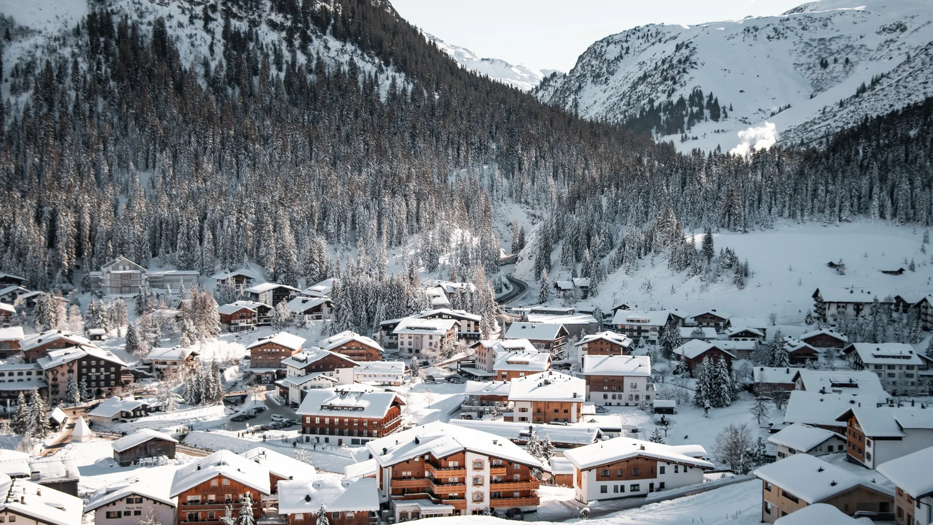 Snow-covered village and ski slopes in Lech am Arlberg, Austria