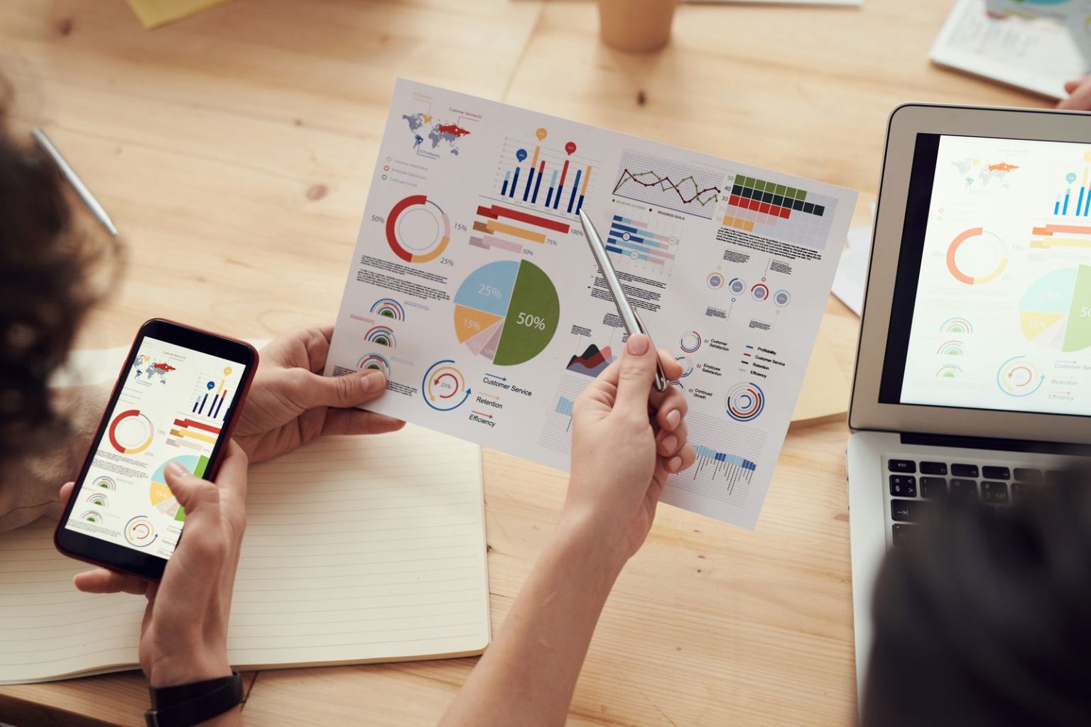 Vertical Expertise Is the Line Between Elite and Ordinary SEO Agencies Vertical Expertise Is the Line Between Elite and Ordinary SEO Agencies: marketing specialists reviewing SEO and campaign analytics charts at a desk