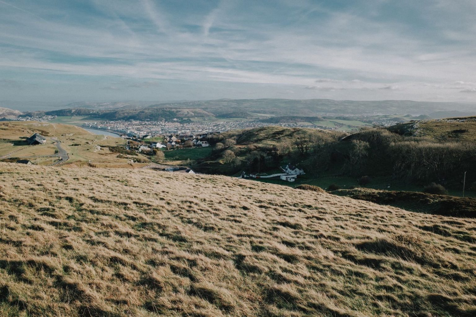 Blackpool, Milton Keynes, Sheffield and Wrexham shortlisted for UK City of Culture 2029 Rolling hills and a town in Wales